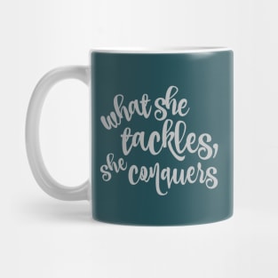 What she tackles, she conquers. Mug